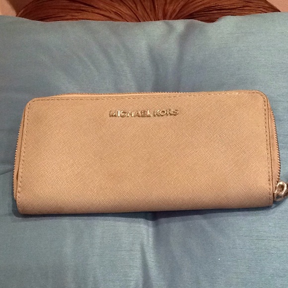 Michael Kors Handbags - Michael Kors gray wallet with many compartments.